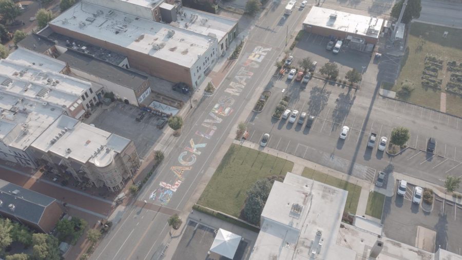 The Black Lives Matter mural stretches along West Broad Street, directly facing Spartanburg City Hall and the Spartanburg Police Department headquarters. Each letter of the mural was painted by a different artist.