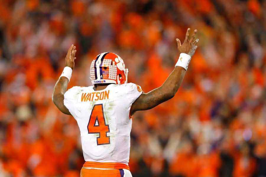 After throwing another touchdown for the Tigers, quarterback Deshaun Watson celebrates during the 2016 CFP National Championship.