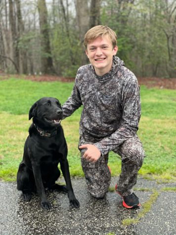 Mills Bullington (9) likes to take his dog Saluda with him when he goes hunting.