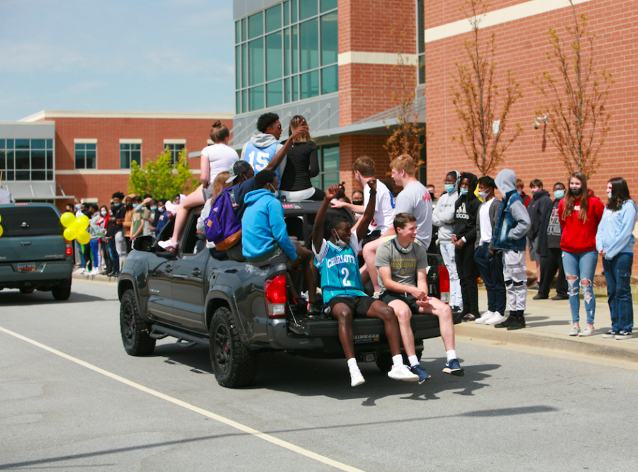 Seniors+paraded+on+decorated+cars+to+celebrate+the+end+of+their+high+school+academic+careers.