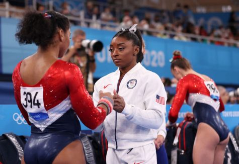 Simone Biles speaks with Jordan Chiles at the 2020 Tokyo Olympics on July 27, 2021.
