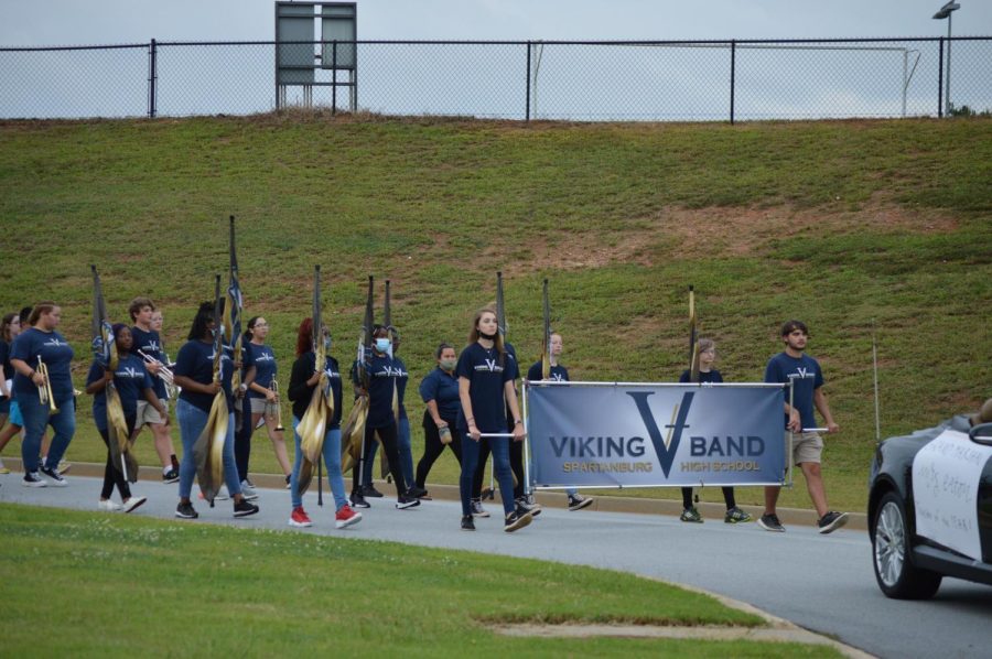 The Viking Band marches in step during the Homecoming parade.