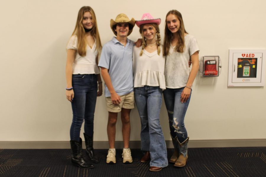 Eryn Wagner (11), Noah Harrell (9), Bella Gibbs (9) and Maggie Akridge (9) all dress up for Country/Western Day.