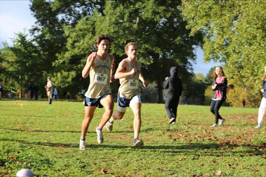 John Bolinger (12) and Mac Salley (12) stride to place first and second at the Spartanburg County meet.
