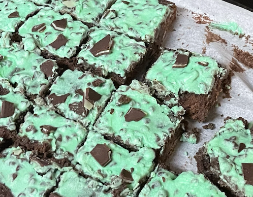 After putting the delicious creamy frosting on top, these brownies are ready to eat.