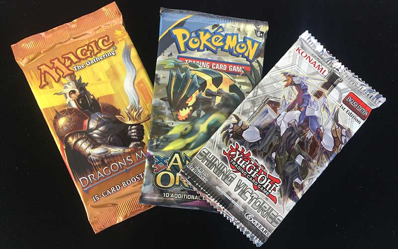 Starter packs for the big 3 trading card games: Yu-Gi-Oh!, Pokémon, and Magic the Gathering.