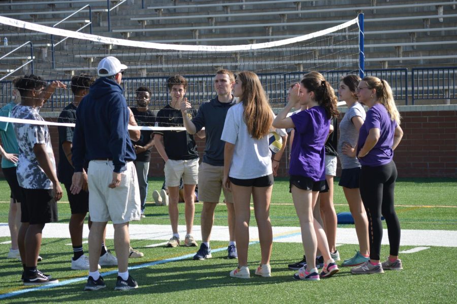 Seniors listen to the rules before their volleyball game on Senior Field Day.