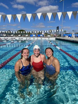 Working towards her goal, McEnroe poses with fellow swimmers at the USA Swimming National Select Camp.