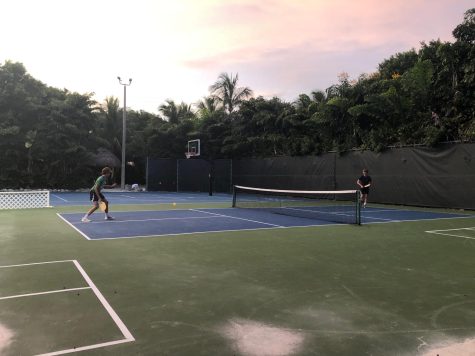 Knox Eaton (10) plays pickleball in the Florida Keys at sunset on vacation.