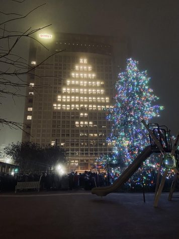 Spartanburgs Christmas tree lighting ceremony in front of the Dennys building which is also lit up for Christmas.
