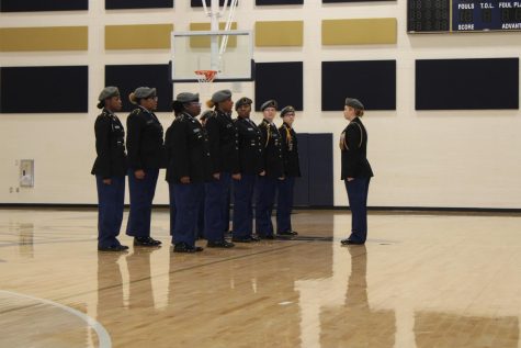 The JROTC does a drill team exhibition for Veterans Day.