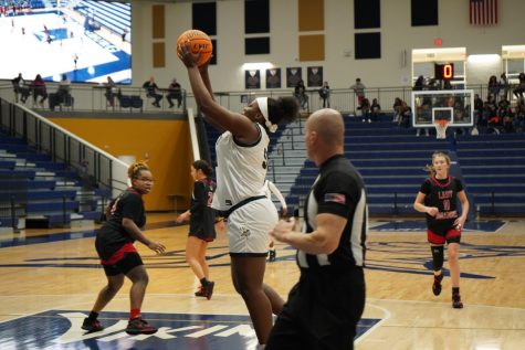 Genesis Young (11) goes in for a layup against Boiling Springs.  