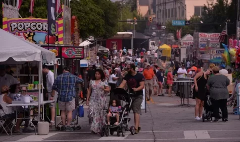 People stroll the streets of Spartanburg during the Spring Fling festival. 