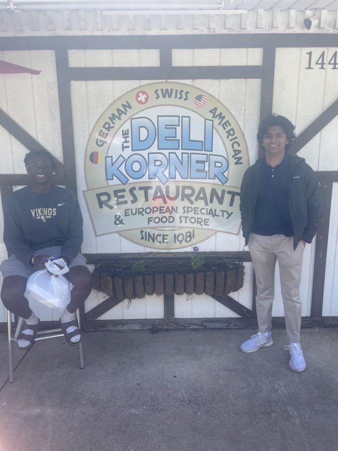 Dev and Lars pose in front of Deli Korner Restaurant for the Upstate Munchies Finale