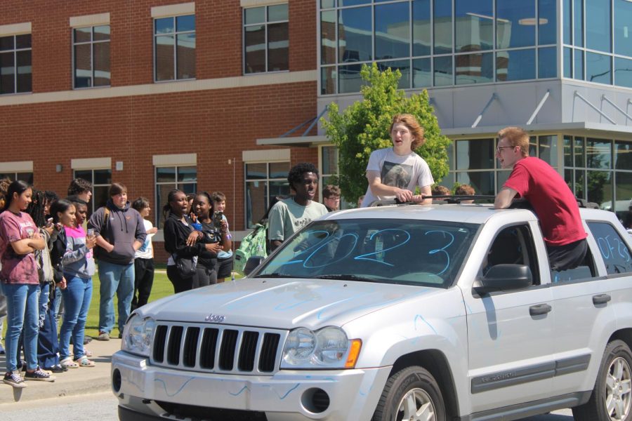 Driven by Nick Tipton (12), Nathan Moseley (12), Rylee Burnett (12) and Wes Sutton (12) ride in the senior parade.
