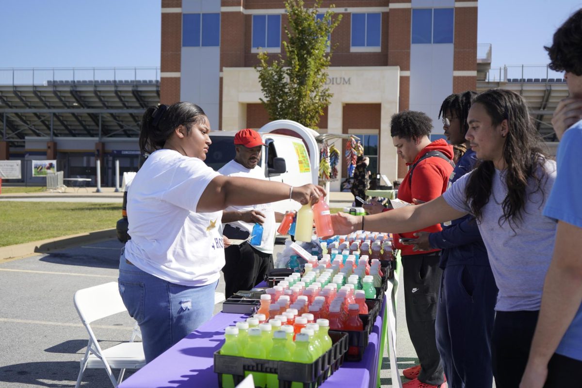 Students buy lemonade of many flavors at Fun Lunch.