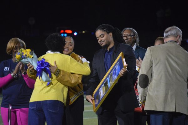 Former track coach, the late Glover Smiley, is represented by his family for the dedication of the newly-named Glover L. Smiley, Jr. Track and Field Complex.