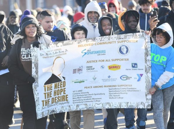 Members of the Black History Club walk throughout Spartanburg in recognition of King. 