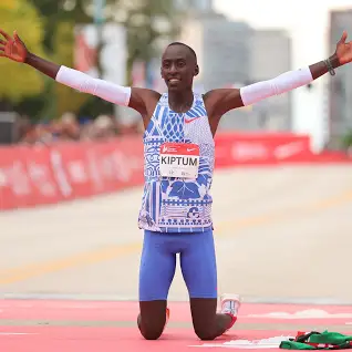 Marathoner Kelvin Kiptum crosses the line after shattering the world record. 