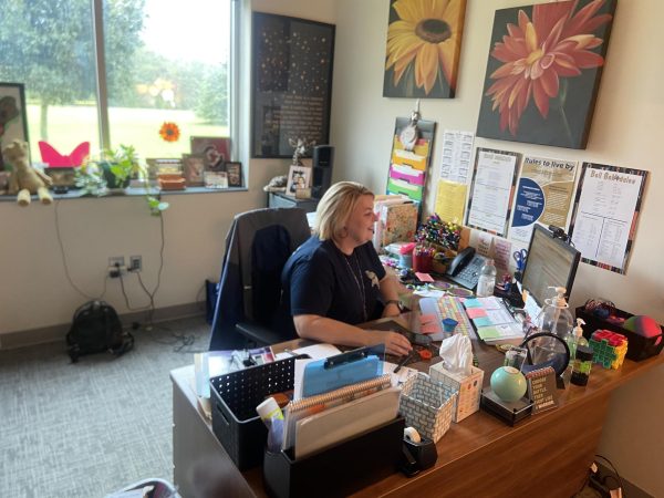 Christi Foster in her office available for students who want mental heath information.