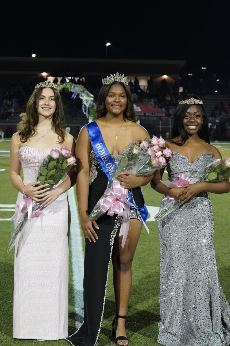 Homecoming Queen, Kamryn Sainvil (12); first runner-up, Nikia Tinsley (12);  and second runner-up, Jennifer Waddle (12). 