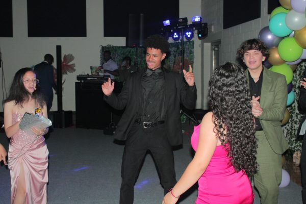 Devan Gentry (10) grooves with his friends on the dance floor.