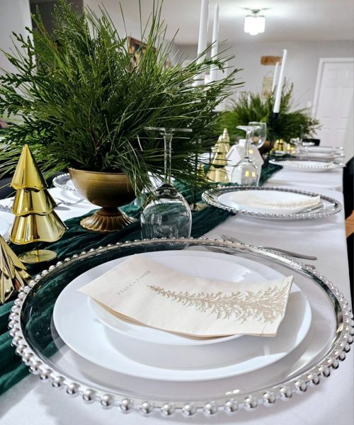 A dinner table set up for holiday celebration.