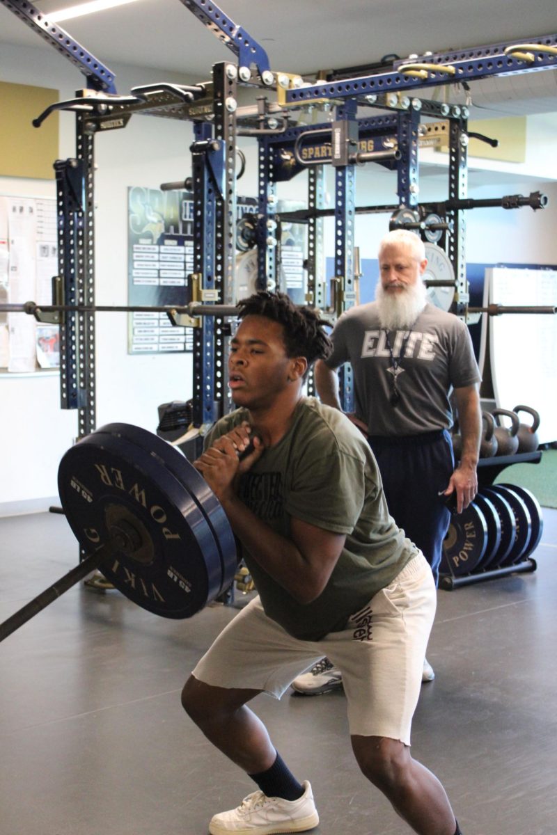 BJ Johnson (10) practices for the Region Strength Meet where he placed second in the Varsity division.