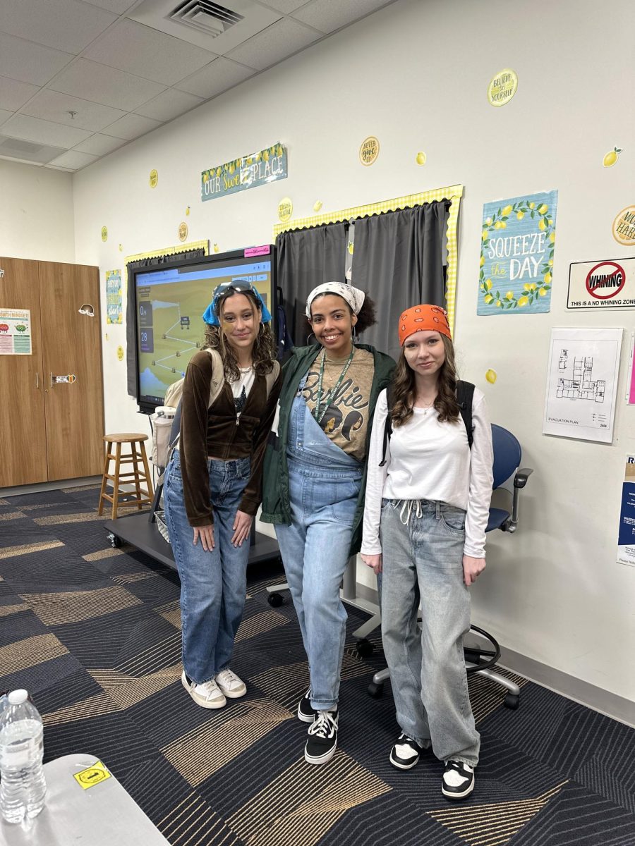 Lillian Arnold (9), Black History Club adviser Sherrina Black and Jasmine Stribling (9) dress up for "Too Fresh Tuesday" wearing their best street wear.