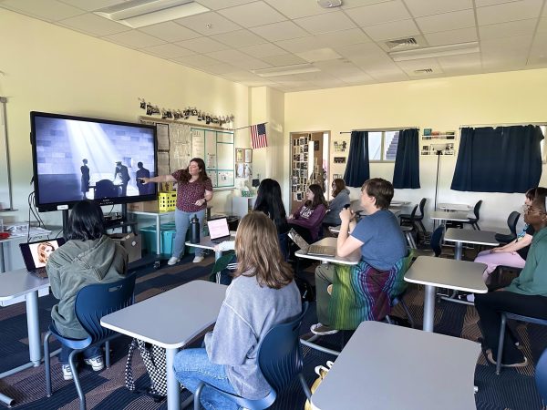 Katie Cockrell talking to her film studies Class about the filming process of one-shot.