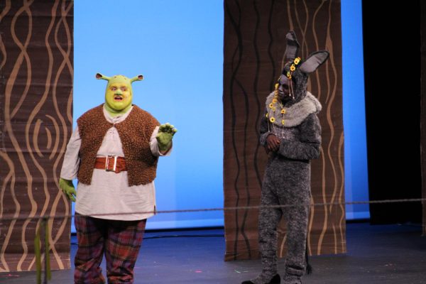 John Perez (12) and Javian Smith (11), working hard for their "Shrek: The Musical" performance.