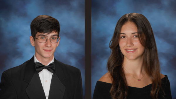 Nick Rhoden (12) and Jennifer Waddle (12) smile for their senior portraits, taking in how far they have come.