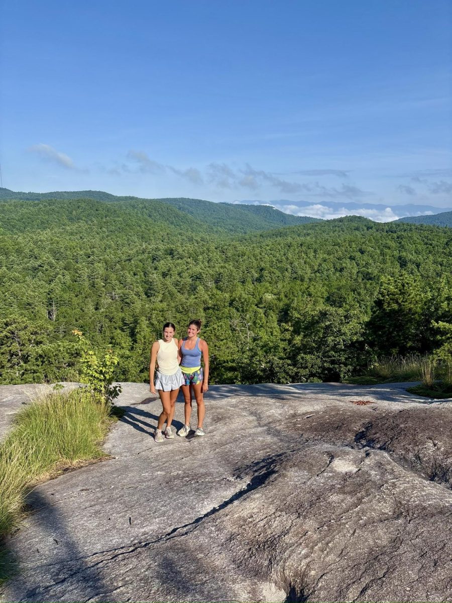 Training during the summer, Helen Colbath (12) and Kaia Brown (10) enjoy the view at Rocky Bottom Cross Country Camp.
