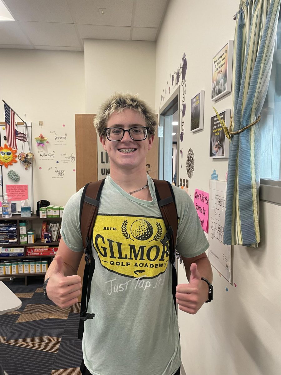 Andrew Brown (10) is pictured with his iconic Happy Gilmore shirt.