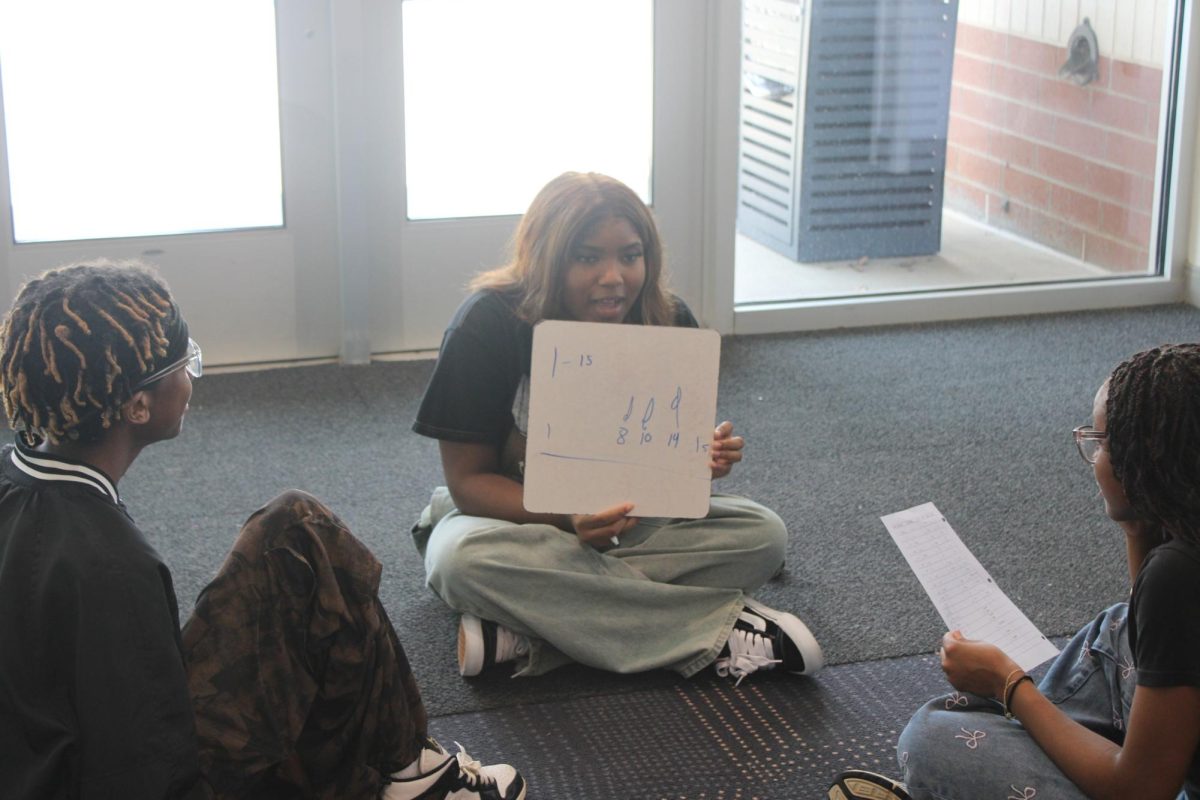 In an effort to learn and grow, students share their ideas on an assignment for their foreign language class.