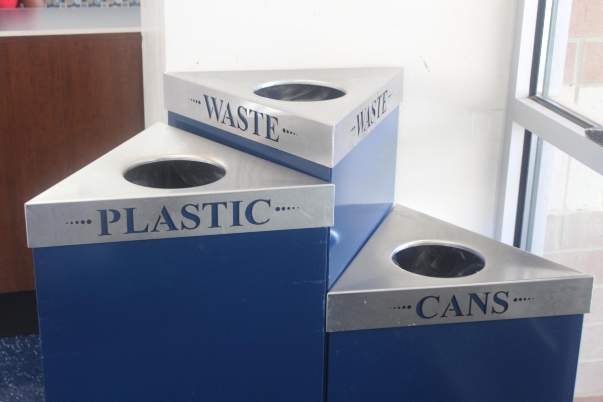 Spartanburg High School encourages students to separate their trash by using labeled trash cans.
