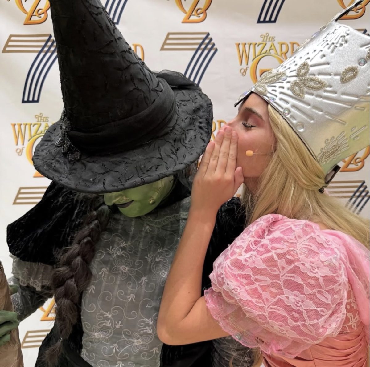 Finley Sloan (12) and Moss Wise (11) pose together in their Wizard of Oz costumes.